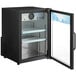 An Avantco black countertop display refrigerator with glass doors.