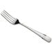 A silver fork with a white background.