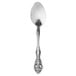 A close-up of an Oneida Michelangelo silver teaspoon with a design on it.