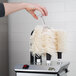 A close-up of a Campus Products StemshinePro Glass Polisher.