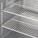 A close-up of a shelf in a Beverage-Air worktop refrigerator.