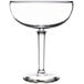 A clear margarita glass with a stem and a rim on top.
