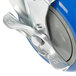 A close-up of a blue Advance Tabco caster wheel.