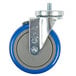 An Advance Tabco enclosed base table swivel caster with a blue and grey metal wheel and screw.