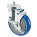 An Advance Tabco enclosed base table swivel caster with a blue and silver wheel.