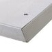 A Vulcan stainless steel back riser with holes in it.