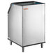 A large silver rectangular Manitowoc ice storage bin with a black top.