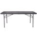 A Flash Furniture rectangular dark gray plastic folding table with metal legs.