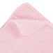 A pink Rubbermaid microfiber cloth with a corner.