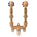 A T&S Brass wall mounted mixing valve assembly with blue and red handles.