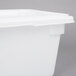 A Rubbermaid white polyethylene food storage box with a lid.