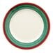 A white plate with a red and green striped border.