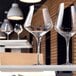 Three Chef & Sommelier Reveal Up wine glasses on a table.