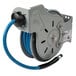 A T&S hose reel with a blue hose attached.