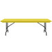 A yellow rectangular Correll folding table with black legs.