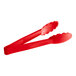 A pair of red plastic tongs with scalloped handles.