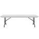 A white rectangular Correll folding table with a gray top and black legs.