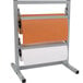 A Bulman Two Deck Tower paper rack holding a roll of paper.