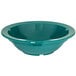 A close-up of a teal Carlisle polycarbonate fruit/monkey dish.
