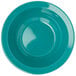 A teal Carlisle polycarbonate fruit dish.