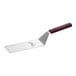 A Mercer Culinary Hell's Handle square edge turner with a wooden handle.