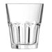 A clear Arcoroc double old fashioned glass with a patterned design on the bottom.