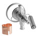 A copper expansion valve with a copper ring on a Manitowoc ice machine.