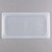 A translucent plastic lid on a plastic container.