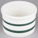 A white bowl with green stripes and a handle.