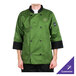 A person wearing a mint green Chef Revival chef jacket with black trim.