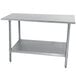 A stainless steel Advance Tabco work table with a shelf.