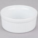 A white fluted ceramic CAC souffle bowl.