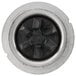 A circular metal disc with a black center.