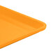 A close up of a mustard Cambro dietary tray.