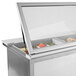 A Beverage-Air stainless steel refrigerated sandwich prep table with glass lids.