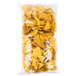 A plastic bag of yellow Mission triangle corn tortilla chips.