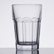 An Arcoroc clear glass beverage tumbler.