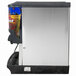 A Servend countertop beverage dispenser with blue and black drink dispensers.