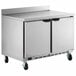 A Beverage-Air stainless steel worktop freezer with two doors on wheels.