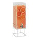 A Cal-Mil plastic beverage dispenser with orange slices in the ice chamber.