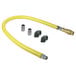 A yellow T&S Safe-T-Link gas connector hose with metal fittings.