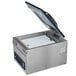 A Hamilton Beach PrimaVac 305 Chamber Vacuum Sealer with the lid open.