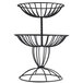 An American Metalcraft wrought-iron two-tier basket stand holding two black wire baskets.