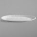 A white oval melamine serving platter with a gray border.