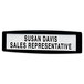 A black and white plastic nameplate with black text on white background.