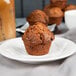 A plate with Bake'n Joy cinnamon coffee muffins on it.