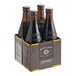 A case of Boylan Bottling Co. Root Beer with six brown bottles on a table.