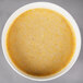 A bowl of yellow corn batter.