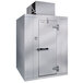 A large grey metal Kolpak walk-in freezer with a door open.