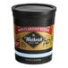 A black Wuthrich clarified butter container with a gold label.
